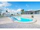 Inviting kidney-shaped pool with surrounding patio at 1401 W Highway 50 # 68, Clermont, FL 34711