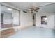 Covered porch with light blue flooring and ceiling fan at 1401 W Highway 50 # 68, Clermont, FL 34711