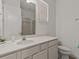 Bathroom with vanity, toilet and shower at 1472 Fairview Cir, Reunion, FL 34747