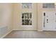 Dining area with large window and hardwood floors at 148 Imperial Oak Ct, Davenport, FL 33896