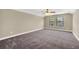 Large bedroom with carpet and ceiling fan at 1580 Prairie Oaks Dr, St Cloud, FL 34771