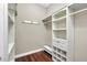 Spacious walk-in closet, built-in shelving, and drawers at 1580 Prairie Oaks Dr, St Cloud, FL 34771