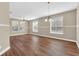 Bright dining room with hardwood floors and neutral walls at 1580 Prairie Oaks Dr, St Cloud, FL 34771