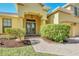 Elegant double front doors with glass inserts and a welcoming entryway at 1580 Prairie Oaks Dr, St Cloud, FL 34771