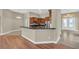 Kitchen boasts wood cabinets, granite counters and an island at 1580 Prairie Oaks Dr, St Cloud, FL 34771