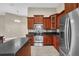 Well-equipped kitchen with stainless steel appliances and island at 1580 Prairie Oaks Dr, St Cloud, FL 34771