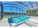 Enjoy this screened pool and lake view at 1580 Prairie Oaks Dr, St Cloud, FL 34771