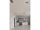 Modern kitchen boasts gray cabinets and an island at 1603 Gardiner St, Haines City, FL 33844