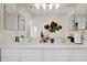 Bright bathroom featuring a double vanity and ample counter space at 1727 Wood Violet Dr, Orlando, FL 32824