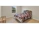 Bedroom with a large window for natural light at 1727 Wood Violet Dr, Orlando, FL 32824
