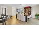 Open dining room with wood floors, comfortable seating, and stylish accents at 1727 Wood Violet Dr, Orlando, FL 32824