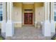 Elegant double front doors and a tiled porch at 19115 Palmview St, Orlando, FL 32833