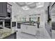 Modern kitchen with white and gray cabinets and center island at 19115 Palmview St, Orlando, FL 32833