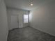 Bright and airy room with tile flooring and a window at 2499 Skyline Loop, Kissimmee, FL 34758