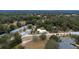 Wide aerial view of the property and surrounding homes at 25335 Troon Ave, Sorrento, FL 32776