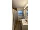 Clean bathroom with shower/tub combo and vanity at 2863 County Road 238 # 238, Wildwood, FL 34785