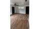 Bright living room featuring new wood flooring at 2863 County Road 238 # 238, Wildwood, FL 34785