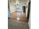 Open living area with new wood-look floors at 2863 County Road 238 # 238, Wildwood, FL 34785