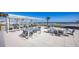 Oceanfront grilling and dining area with seating at 3000 N Atlantic Ave # 17, Daytona Beach, FL 32118