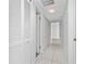 Clean and bright hallway with white doors and tiled floors at 310 Cherokee Ct # B, Altamonte Springs, FL 32701