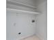 Laundry area with white shelves and hookups at 310 Cherokee Ct # B, Altamonte Springs, FL 32701