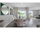 Bright dining area with table and chairs, looking out to a backyard view at 3818 Royal Azalea Way, Sanford, FL 32773