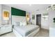 Spacious main bedroom with king-size bed and en-suite bathroom at 3818 Royal Azalea Way, Sanford, FL 32773