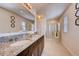 Double vanity bathroom with granite countertop and walk-in shower at 3834 Royal Azalea Way, Sanford, FL 32773