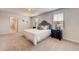 Spacious bedroom with carpeted floor and ensuite bathroom access at 3834 Royal Azalea Way, Sanford, FL 32773