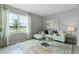 Relaxing living area with white couch and large window at 3838 Royal Azalea Way, Sanford, FL 32773