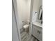 Clean bathroom with toilet and vanity, showcasing modern design at 3901 Sw 161St Loop, Ocala, FL 34473