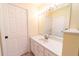 Bathroom with vanity, mirror, and additional storage at 3934 Ne 21St Ln, Ocala, FL 34470