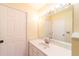 Bathroom with vanity, large mirror, and storage at 3934 Ne 21St Ln, Ocala, FL 34470