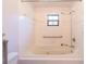 Bathroom with shower and bathtub at 3934 Ne 21St Ln, Ocala, FL 34470