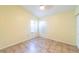 Simple bedroom with tile floors and a ceiling fan at 3934 Ne 21St Ln, Ocala, FL 34470