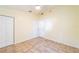 Bright bedroom with tile floors and double closets at 3934 Ne 21St Ln, Ocala, FL 34470