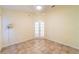 Bright bedroom with tile floor and French doors at 3934 Ne 21St Ln, Ocala, FL 34470