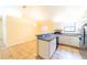 Kitchen with stainless steel appliances and light-colored cabinets at 3934 Ne 21St Ln, Ocala, FL 34470