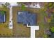 Top-down view of house, landscaping, and driveway at 39715 Royal Trails Road, Eustis, FL 32736