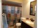 Clean bathroom with shower/tub combo and vanity at 4131 Yorketowne Rd, Orlando, FL 32812