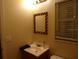 Small bathroom with a single sink and toilet at 4131 Yorketowne Rd, Orlando, FL 32812