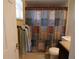 Bathroom with shower/tub combo and vanity at 4131 Yorketowne Rd, Orlando, FL 32812