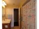 Bathroom with shower, vanity and access to another room at 4131 Yorketowne Rd, Orlando, FL 32812