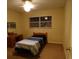 Simple bedroom with twin bed and window at 4131 Yorketowne Rd, Orlando, FL 32812