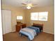 Small bedroom with double bed and ceiling fan at 4131 Yorketowne Rd, Orlando, FL 32812