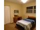 Small bedroom with double bed and large closet at 4131 Yorketowne Rd, Orlando, FL 32812