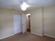 Bedroom with carpet flooring, a ceiling fan, and closet space at 4131 Yorketowne Rd, Orlando, FL 32812