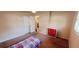 Bedroom with neutral carpet featuring closet, dresser, twin bed, and natural light at 4131 Yorketowne Rd, Orlando, FL 32812