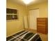 Bright bedroom with double closet and window at 4131 Yorketowne Rd, Orlando, FL 32812