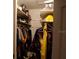 Well-lit closet with shelves and hanging rods at 4131 Yorketowne Rd, Orlando, FL 32812